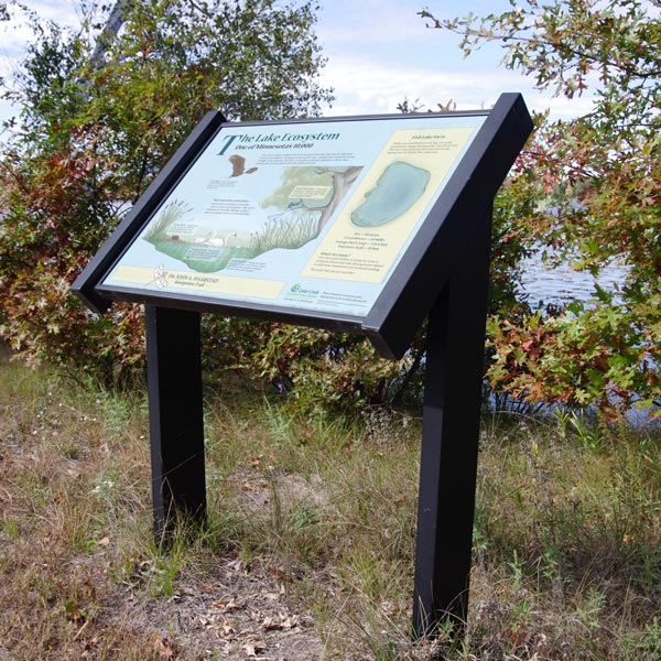 Cantilever base with interpretive sign on trail around Fish Lake